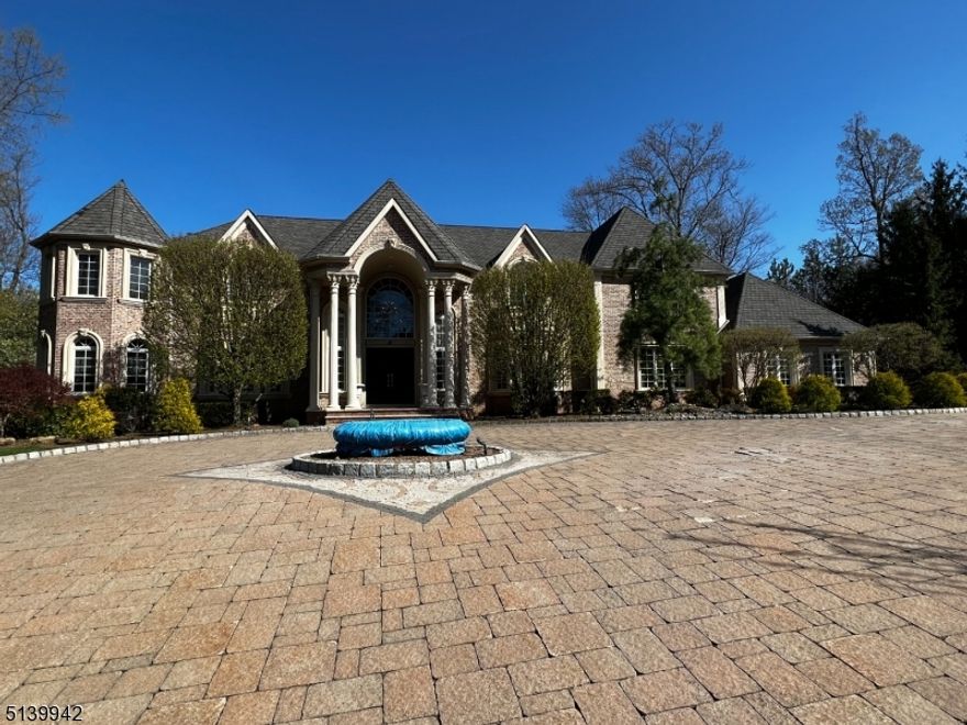 Exclusive Rio Vista. Custom built home, very prestige. Exterior and Interior custom designed. Full living space with a lovely backyard. Grand Foyer, LR, DR, Lib w/ FP, GR w/ FP, EIT w/ separate siting area, Sun Room, Laundry Room, 1st FL BDR w/ full bath, 4 Full BTR's w/ (2) Jacuzzi's on the 2nd Fl, 5 Bathrooms, Fully Finished basement w/ Full kitchen + custom bar, 2 BDR 1 BTR, Master suite w/ Steam shower, Balcony overlooking GR, Prayer room, (2nd) laundry room, theatre room, sitting area w/ FP, walk in closet, walk out entrance. Stone Pillar Driveway, Separate staircase for attic, (18) zones for heating and cooling, (3) water heaters, state of the art alarm system, (4) car garage