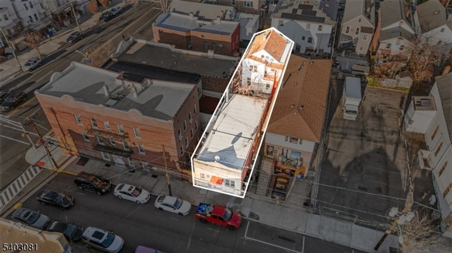 Owning a 3-family in Bayonne is rare, and this 8-bedroom, 4-bath property is truly one of a kind. Located in the heart of Bayonne near John F. Kennedy Blvd, this unique setup features a stand-alone single-family home in the front and a separate two-family residence in the rear, all on one lot. Enjoy easy access to NYC transit, major bus lines, the Light Rail, shopping, restaurants, and nearby parks. A flexible layout, private entrances, and unbeatable location make this a rare opportunity you need to see in person to fully appreciate.