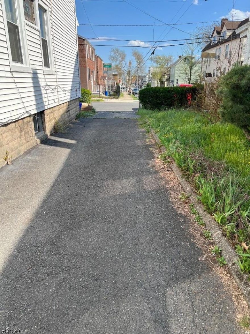 Beautiful well maintained 2 family home. This house feature in the first floor 3 bedrooms, living room, eat-in kitchen and full bathroom. 2nd floor w/ 4 bedrooms living room, dining room, eat-in kitchen and full bathroom. Finished basement and more. owner has  Real Estate License. Survey in place and double lot subject to subdivision.