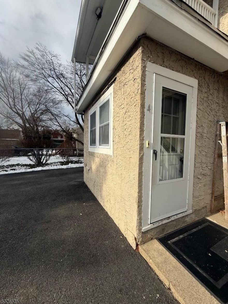 Completely Renovated 1st floor unit in Historic Schoolhouse featuring new White Cabinetry, Quartz Veined Countertops, SS Appliances and even a SS Dishwasher for the savy chef who likes to cook and make cleanup easy. The dining area is off the Kitchen and steps to the rear yard with off street assigned parking spots for 2 cars in exclusive private lot. This Charming Historic renovated 1st floor unit with todays updates, laminated floors, French door to Brm, shared laundry area in building is a must see with walking distance to town center and train to NYC. Boonton features many wonderful eateries, shops and close to 287, 80 and all other main arteries. The 2 Private entrances in the front and back is a nice convenience. Wonderful 1st fl. apt. Great location. LL requires good credit, NO PETS, No Smoking . WON'T LAST!!