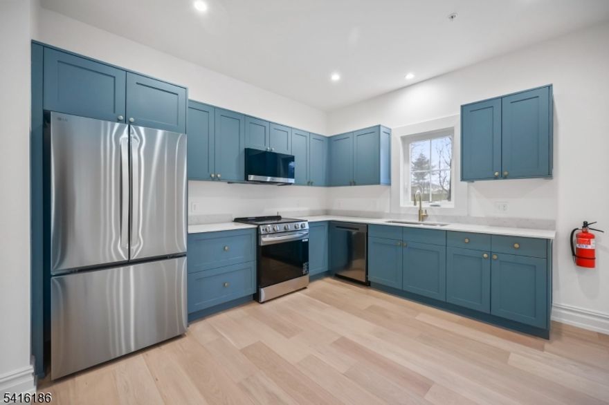 Welcome to 1209 Littleton Road! Truly high-end! A brand-new, modern, and spacious residence in a beautifully designed multifamily building. This 2-bedroom, 1 and 1/5 baths apartment combines contemporary style, comfort, and convenience in a quiet setting while keeping you close to everything you need. This bright and thoughtfully designed unit features beautiful wood floors, soundproof construction, and large windows that fill the space with natural light. The modern kitchen is equipped with premium LG appliances and excellent storage. The home is also smartphone integrated. Additional features include washer and dryer in unit and two parking spaces. Excellent location: Located across the street from the high school and just around the corner from the elementary school, this property is also close to restaurants, parks, houses of worship, gyms, and everyday conveniences. Easy NYC commute; convenient access to train and bus routes to New York City, making commuting simple.1209 Littleton Road is the perfect balance; close enough to major roads for convenience, yet set back enough to enjoy the quiet and comfort this apartment offers. Renter's insurance required. Credit check, income & employment verification required. A background report is required for all applicants 18 years and older