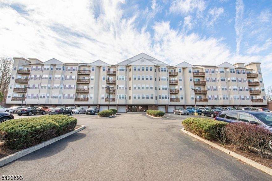 Nice 55 Plus building located in Woodland Park. It is located on top of Garret Mountain. Building has loads of parking but this unit offers a GARAGE. which is real premium in this building.  This 4TH FLOOR PENTHOUSE unit offers fantastic views of the mountains from it's balcony. The kitchen has an abundance of cabinets. Nice size laundry room  which as for additional storage.  Beautifully maintained by it's current owner with shining floors and granite counter top. Note: Separate tax bill for garage of $585.