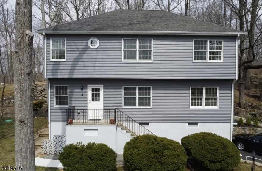 Beautifully maintained 3-bedroom, 2-bath home with approx. 0.5 acre located in the desirable Lake Hopatcong area, offering the perfect blend of comfort and lifestyle. This home features a spacious living room, formal dining room, and a functional layout ideal for both everyday living and entertaining. House was COMPLETELY  remodeled  2011 and BRAND NEW SEPTIC INSTALLED  2025. Enjoy a large private backyard perfect for gatherings, relaxation, or outdoor activities.Conveniently located within walking distance to Lake Hopatcong, giving you easy access to one of New Jersey's most sought-after lake communities. Optional membership provides access to private lake amenities, making it ideal for boating, swimming, and enjoying everything lake life has to offer. A great opportunity to own near the lake in a prime location don't miss this one! Now offering EXCEPTIONAL VALUE.