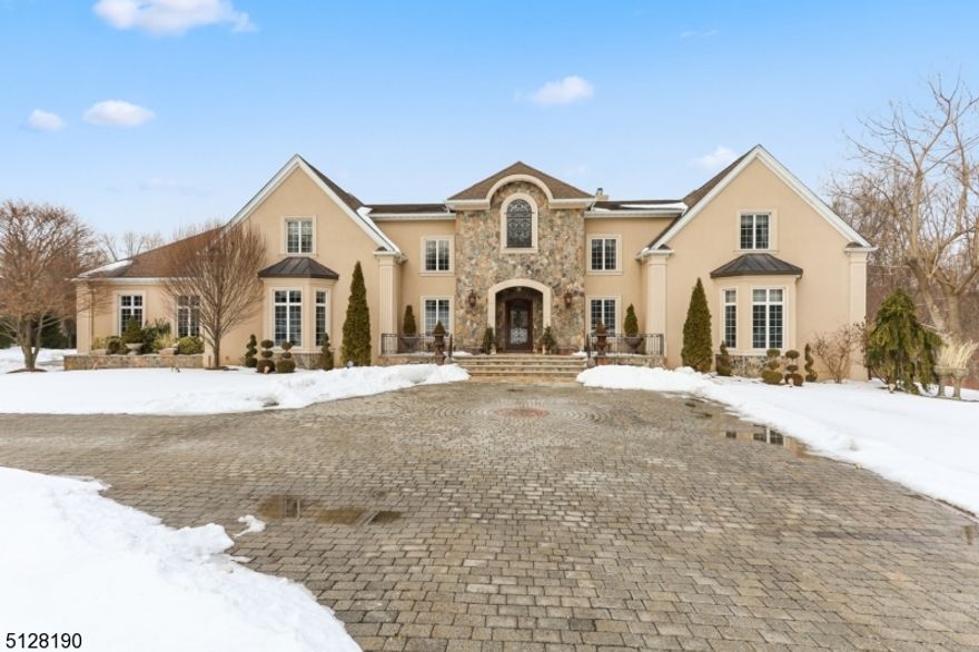 Take splendor in this magnificent 15,000 sf Tuscan villa in the prestigious neighborhood of Hawk Hill.  Situated on 2.7 acres at the end of a cul de sac and surrounded by 80 acres of green space, this home offers ultimate privacy and luxury.  The backyard is a true oasis featuring a heated in ground pool. There is extensive outdoor landscaping. This dream home features 6 ensuite bedrooms, 7 full and 3 half baths, 3 kitchens, 5 gas fireplaces, 5 garage spaces.  The primary bedroom has a sitting area with fireplace and wet bar. The main kitchen is eat in and a chef's delight with custom wood cabinetry, granite counter tops, and Viking appliances.  The kitchen/family room has a fireplace and doors out to a gorgeous, elevated deck overlooking the beautiful backyard.  Entertain in the spacious formal dining and living rooms which boast gorgeous Bordeaux, wood flooring.  The living room has a wet bar, 200 bottle wine fridge and soaring marble fireplace.  There are 2 offices which suits todays work at home environment. Downstairs is another full living space complete with bedroom and full bath, beautiful eat in kitchen, family room with tin ceiling, recreation/game area, media room with surround sound, sauna, full "pool  bath, home gym, 3,000 bottle wine cellar and huge wet bar.  This is an amazing space for at home fun, entertaining guests, or even an in law suite.  Go outside from this lower level onto a beautiful outdoor, covered patio complete with outdoor kitchen.