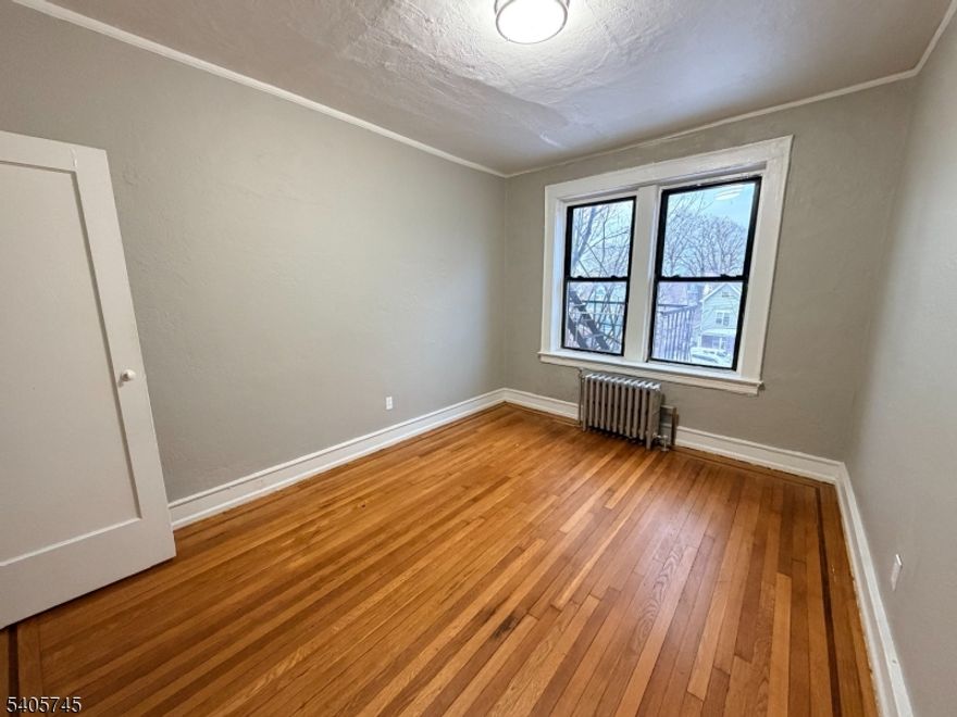 Updated 1-Bedroom Apartment in Prime Newark Location! Welcome to this updated 1-bedroom, 1-bath apartment located on the 4th floor of an elevator building, offering a convenient and comfortable living space. The apartment features an updated kitchen with a modern feel. The building includes a coin-operated laundry room in the basement for added convenience.Situated directly across from Phillips Park, this location offers easy access to local restaurants, public transportation including NYC bus routes, and nearby schools, including Luis Munoz Marin Elementary School. A great opportunity to enjoy a well-located apartment at an excellent value. Schedule your showing today!