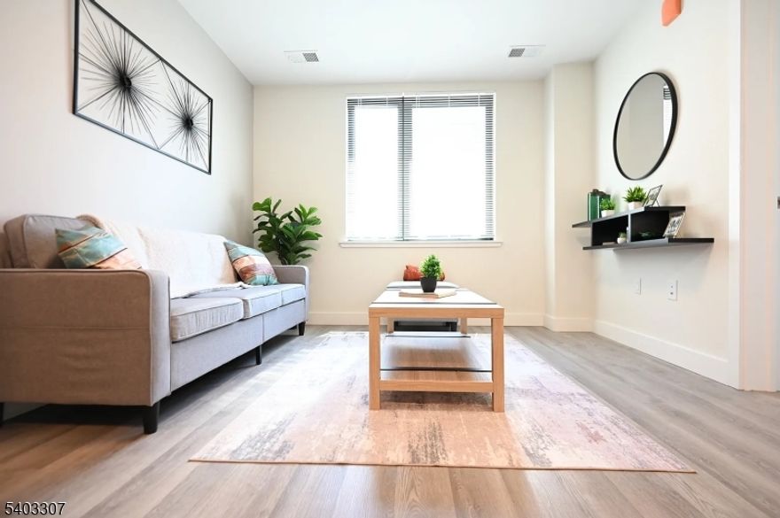 We're thrilled to welcome you to our vibrant & convenient community, centrally located right in the heart of Orange, NJ. Step into the epitome of luxury with our meticulously designed residences. Choose from a stylish selection of studios, one-bedroom, and two-bedroom residences, each thoughtfully designed with modern living in mind. Each residence features functional kitchens that inspire your inner chef, equipped with sleek gallery stainless steel appliances, gas range cooktops, and built-in microwaves. Plus, enjoy the convenience of eco-friendly heating and cooling systems, spacious walk-in closets & in-home laundry, ensuring that your day to day is hassle-free.But that's just the beginning! Indulge in a suite of fabulous amenities that elevate everyday living to extraordinary heights. Unwind in the comfortable resident's lounge, perfect for socializing or lounging with neighbors. Stay active and crush all of your fitness goals in our fitness center and don't miss the opportunity to catch a breeze from our rooftop terrace! Also, benefit from the convenience of designated on-site parking! But it gets better! There's no amenity fee you get to enjoy all of these amenities for just being one of our residents! SUMMIT Orange Crossing is just one block from the NJ Transit Orange Train Line, bus routes & all major highways making your NJ or NYC commute a breeze. Experience the SUMMIT of modern rental living! Welcome Home!