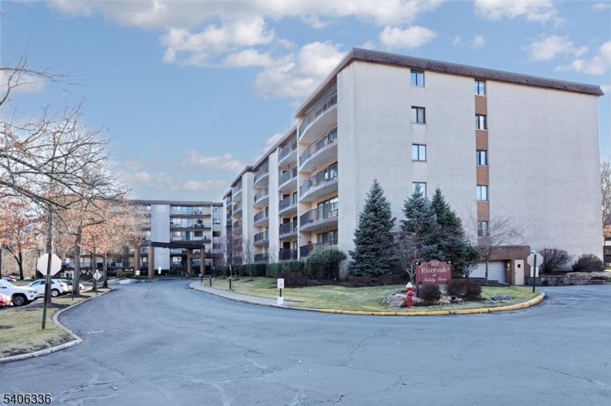 Welcome to this lovingly maintained, spacious,  two bedroom unit. This home is move in ready with nothing to do but enjoy the open floor plan with access to a large patio and updated kitchen. The primary bedroom offers a large walk in closet and beautiful primary bath.  The main bath is stunning and the second bedroom is a great space for guests or a home office.  This is a corner unit with lots of windows, natural light and great closets throughout.  An indoor garage space as well as an outdoor parking spot are an added convenience. All heat, air conditioning, water, as well as building and outdoor amenities are included in your HOA!