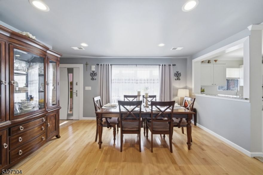 EXCEPTIONAL CUSTOM HOME all redone: Set on 55x100 private, beautifully landscaped yard in one of Parlin's most coveted neighborhoods, this Colonial blends timeless elegance w/ modern comfort. Offering 4 bedrooms & 2 full baths, the home is filled w/ natural light & enhanced by recessed ceilings lights, exquisite decorative details. A chef's gourmet kitchen, appointed w/ granite countertops & top-tier appliances, custom cabinetry & an additional breakfast table area which seamlessly opens to direct access to the patio & backyard backing to woods--creating the perfect setting for effortless indoor-outdoor entertaining. Designed for both everyday living & refined hosting, the home also features a warm & inviting living room and a formal dining room, & a cozy bonus room. A newly finished baths are additional bonus along w/ abundant storage, completing this thoughtfully designed residence.Close to NYC bus,train, main roads,shopping plazas, and Kennedy Park offering tennis courts,playgrounds,Pickleball courts,walking paths along the lakes,this home offers a rare opportunity to enjoy a premier location.