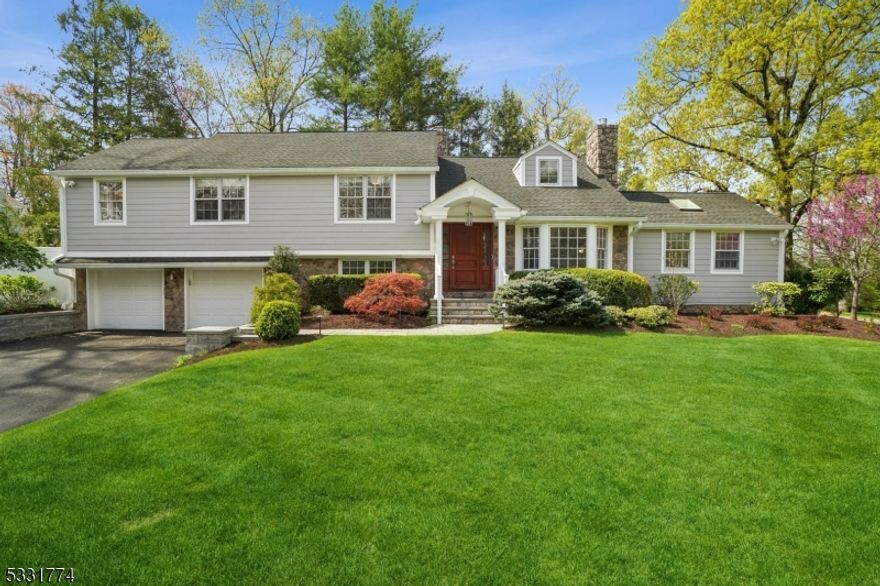 This stunning home boasts striking curb appeal highlighted by a custom wood front door flanked by matching side panels.  Offering 4 bedrooms, 2.1 baths, this gorgeous custom home perfectly blends classic sophistication with modern luxury, all in a prime location.  An expansive layout offers refined living with a formal living room,  gas fireplace and custom built-ins,  formal dining room featuring a built-in china cabinet,  spacious family room and an office equipped with custom cabinetry.  A convenient first-floor powder room adds practicality to this elegant design.  The heart of the home is a chef's kitchen designed for culinary excellence, boasting a large island, abundant counter and cabinet space, high-end stainless steel appliances, sliders to the private oasis with a complete kitchen, fire pit, fenced in backyard,  perfect to entertain.  The luxurious primary suite serves as a private retreat is complete with a well-appointed bathroom w/ dual vanities, oversized stall shower and custom fitted walk in closet.   Furthermore, the second level boasts two bedrooms, main bathroom adorned in neutral tones complete with shower over tub.  Guests will enjoy the privacy of the third-floor bedroom.  The lower level provides a recreation room,  laundry facilities and oversized two car garage. This exceptional home is made for comfort and entertaining.  Close-by to Hartshorn elementary school, Gero Park, Mid-Town Direct Train, Millburn downtown shops and restaurants.