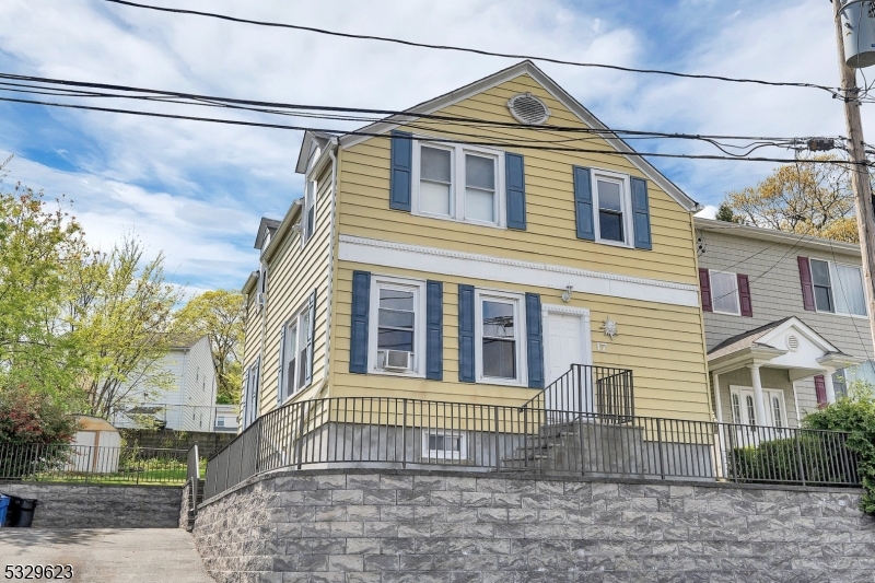 Bright, freshly painted first floor apartment located on a dead end street. It's just up the road from the Haledon Borough Hall. This unit offers an eat in kitchen with granite countertops and newer appliances, a large living room that provides a glimpse of the NYC skyline and plenty of room. Down the hall are two bedrooms, closet storage and full bath with tub/shower. Tenants will enjoy hard wood floors throughout, designated washer/dryer hook ups in the basement, patio off of the kitchen, shared use of the large fenced in back yard, 1 of 2 off street parking spaces, and basement storage. Lawn care and water is provided by the landlord.Tenant applications include credit check, rental application and copy of drivers license.  Tenant pays 1 1/2 month security deposit, first month rent and 1 month tenant premium at signing