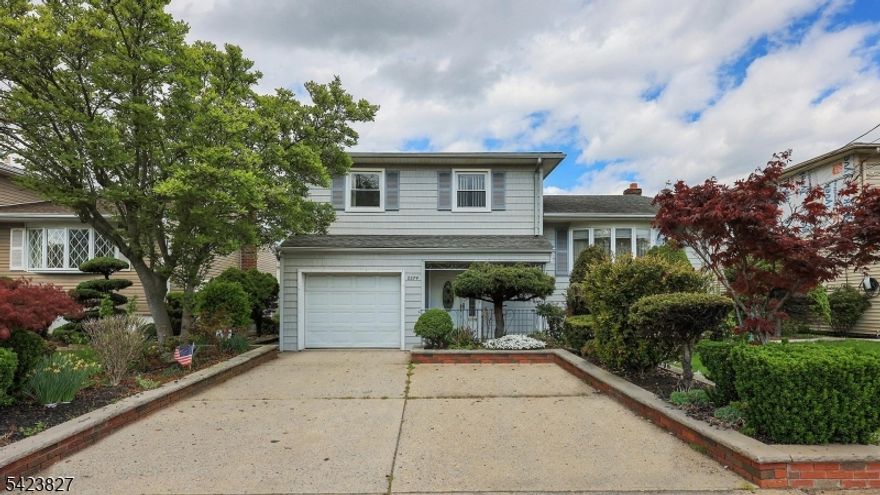 PICS 4/21! Opportunity to bring your vision to life in this 3-bedroom, 1.1-bath split-level home in Rahway, set on a 50x100 lot. Offering a flexible and functional layout, the home features a welcoming ground-level foyer, family room, and powder room, providing additional living space and everyday convenience. The main level includes a formal dining room, eat-in kitchen, and comfortable living areas ready for your personal touch. Upstairs, you'll find three bedrooms and a full bath. The finished basement expands the home's potential with a spacious rec room and summer kitchen ideal for entertaining, hobbies, or creative use. Outdoor features include a large patio, boxed garden beds, and a storage shed, offering space for gardening, relaxing, and enjoying the property. An attached garage with interior access adds further convenience. This home presents a wonderful opportunity for buyers looking to update, renovate, and create something truly their own. Being sold as-is. Buyer is responsible for obtaining the Certificate of Occupancy and any required inspections. Estate sale.