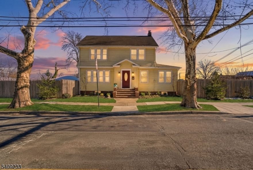 Welcome to this beautiful and spacious single-family home located in the highly desirable Elmora section of Elizabeth. Situated on a rare corner-to-corner lot, this property offers two private backyards, including one side beautifully finished with pavers?perfect for entertaining and outdoor gatherings. The home features 3 generously sized bedrooms and 1.5 bathrooms, along with a finished basement and a finished attic, providing ample living and storage space. The marvelous kitchen boasts granite countertops and plenty of cabinet space. Enjoy an abundance of natural light throughout, especially in the formal dining room, highlighted by double sliding glass doors that lead directly to the backyard. Additional highlights include original hardwood floors throughout the property, separate and convenient laundry area with double washer and double dryer located on the 2nd floor, a spacious den, perfect for a home office, playroom, or game room. Conveniently located near public transportation, major highways, and just 20 minutes to NYC, this home offers both comfort and accessibility. A truly special property you don?t want to miss!