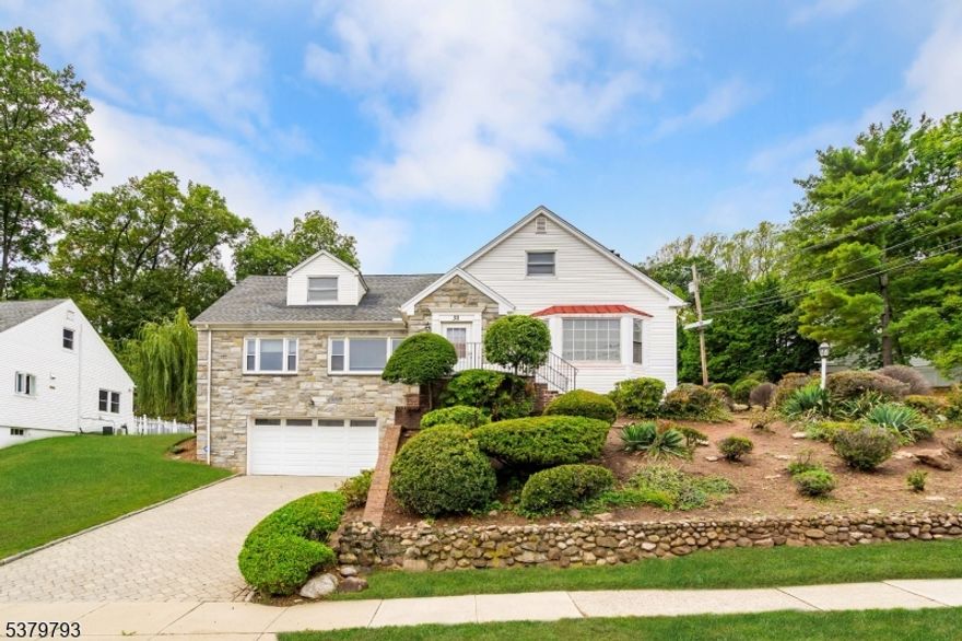 Spacious 5-bedroom, 3-bath Colonial Cape located in the highly sought-after Gregory section of West Orange, featuring stunning New York City views. This expanded home offers an abundance of living space, with generously sized rooms, a full bath on every level, a finished basement, and a flexible second-floor layout ideal for work-from-home options.  The first floor features a welcoming foyer, bright living room, formal dining room, and large eat-in kitchen, along with two bedrooms and a mudroom providing access to the yard. The second floor includes three additional bedrooms, a den, and a large sitting room that can serve as a second living area or home office.  Situated on a 91' x 103' lot, the property offers outdoor living space with a slate patio and level lawn area. A two-car built-in garage with interior access and a brick paver driveway accommodating four cars adds both convenience and curb appeal.  Prime location for commuters with easy access to NYC trains and buses. Close to Rock Spring Golf Club, Turtle Back Zoo, South Mountain Reservation, the Dog Park, and the Fairy Trail, as well as schools, shopping, and dining.  Bring your vision and make this spacious Gregory-section home your own.