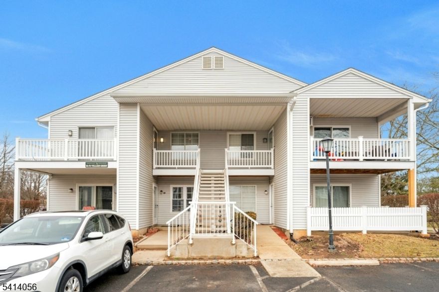 This renovated second-floor condo in Village Green features 3 bedrooms and 1.5 baths. Highlights include the updated kitchen with stainless steel appliances & granite countertop, living room with sliding door leading to private deck, wainscoting in the dining area and main hallway, updated full bath with walk-in shower with seat and conveniently located powder room, hardwood floors throughout, central air conditioning, abundant closets and a private terrace. Residents enjoy close proximity to shopping, restaurants, a pool, tennis courts, clubhouse with exercise facilities, and scenic bike and jogging paths. With convenient access to I-78 and I-287, commuting is easy, and public transportation options like NYC trains and buses are just minutes away. Bridgewater Commons Mall is nearby, while Newark International Airport and Prudential Center are only 30 miles from your doorstep. Discover the vibrant Hills lifestyle in this welcoming countryside community!