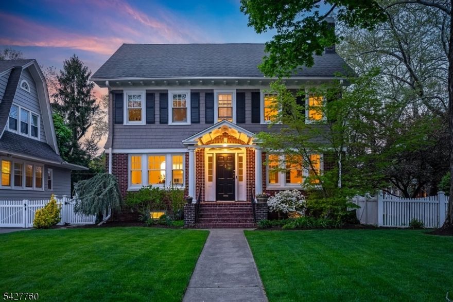 Set on a beautiful tree-lined corner rests 5 Ardsley Rd. This handsome brick and ccedar sun-filled Center Hall Colonial is the perfect mix of its original charming details and lovely modern upgrades. The sleek kitchen is outfitted with beautiful Italian appliances and cabinetry, with well-thought-out organizational details that any chef would admire, open to the sitting room. Waterfall center island provides cooktop, wood block cutting board & beverage refrigerator. Stainless steel double oven & undermount sink, built-in refrigerator and cabinets are all part of the flawless deisgn. The main floor offers many rooms for entertaining and relaxation, including a sitting room open to kitchen, and a separate den. Four spacious bedrooms on the second floor, boasting a lovely en-suite primary with refined newer bath plus main modern bathroom, are perfect for everyday living. The fifth bedroom, bonus room or office, and full bath on 3rd level are ideal for a work-from-home lifestyle. A fully finished lower level with a large recreation room, fitness room, office nook and more is a great escape for movie or game night. The outdoor retreat is just that, with a fully fenced-in garden and a lovely patio nook  of bluestone patio for quiet downtime or outdoor barbecues. Centrally located near the highly-rated Forest Avenue School, .7 miles to the train to NYC & steps to Montclair restaurants and shops. See attached Feature Sheet for more details on upgrades & improvements.