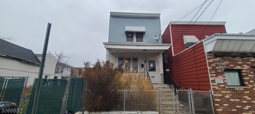 31 W 20th St is a single family detached home in need of some TLC.  Located in Bayonne, Hudson County, New Jersey. This property offers an open front porch, two bedrooms, one and a half baths, a living room, a dining room, an eat-in kitchen and a basement. Conveniently located near Route 440 and just minutes away from other major roadways and transportation. Very close proximity to restaurants, grocery stores, hospital, and approximately 10 minutes to Newark Airport. This property is heated with oil.  House will not qualify for FHA financing.  Call and schedule an appointment today.