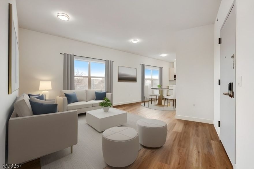 Experience modern luxury in this newly built 2-bedroom, 2-bath 929 sq. ft apartment, located in a prestige 9-unit mid-rise elevator building in a prime Paterson location! Each unit is thoughtfully designed for comfort and convenience, featuring a primary en suite bathroom, in-unit GE washer and dryer, stainless steel GE appliances (including an electric range, microwave, and dishwasher), and a stainless steel Frigidaire refrigerator - prioritize energy-saving solutions across the Board. Climate control is easy year-round with PTAC wall-mounted heating and cooling systems! Close to schools, restaurants, shopping, and transportation. For added security and convenience, the building includes a ButterflyMX virtual doorman system at the lobby and a smart lock on your front door. Additional Details: Pets allowed with conditions $50/month per pet, parking limited indoor and attached garage parking available for $150/month, application fee $35 per applicant, 1.5 months security deposit, and tenant insurance is required.