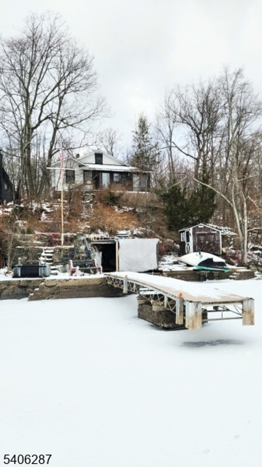 Wonderful lakefront opportunity on Byram Cove.  This original lake style home on a deep lot offers massive potential with a spacious concrete bulkhead and dock area, coveted flat parking for many vehicles, and a home offering a great vantage point and the ability to reimagine what's there or maybe start entirely new.