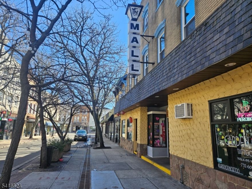 Office space for rent on the 2nd floor inside "The Mall". The unit is divided into two areas and is currently being used as an attorney's office. Located in the heart of Rahway's Business District, around the corner from Rahway train station & Rahway's continuing revitalization. The unit shares two bathrooms with 3 other units. Tenant is responsible for electric which will be calculated based on square footage; landlord pays gas, water, and sewer. Convenient public parking garage located directly across the street. Rental requirements: Credit check, completed rental application, current tax return/last 2 pay-stubs, 2 months security, 1st month's rent and $75 refundable key deposit. Lease will be provided by landlord.  Current tenant is willing to leave furniture for new tenant if needed.