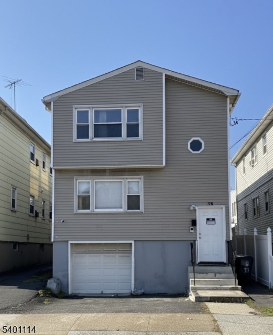 Discover this spacious two-family home at 178 Fabyan Place in Newark's Weequahic section. This well-maintained property offers 6 bedrooms, 2 bathrooms, a finished basement, and washer/dryer hookup, giving you plenty of room and flexibility for living or rental income. A private driveway plus a nice-sized backyard provide valuable outdoor and parking space.Perfect for investors or owner-occupants looking for strong potential, this home sits in a convenient location right off I-78, only 8 minutes to Newark Airport, and about 35 minutes to NYC. Close to schools, parks, shopping, and public transportation, this is a great opportunity in one of Newark's most in-demand neighborhoods.