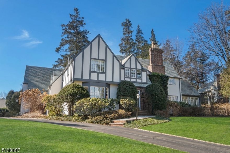 Completely renovated sun-filled Colonial/Tudor located on Summit's Northside and only 1/2 mile from Summit's downtown. A recent renovation includes  a new gourmet kitchen and all new bathrooms. The first floor is open and includes a mudroom and two possible office locations. Front and back stairs to the second floor and 5 bedrooms, 3 new full baths, a powder room and the laundry. Level fenced backyard with bluestone patio surrounded by mature landscaping.