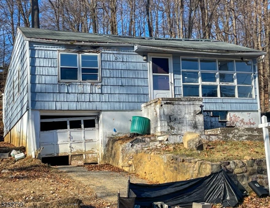 Excellent opportunity to build your ultimate lake house in desirable White Meadow Lake. House being sold "as is", with interior demo already performed. Architectural plans for a 2400+ sq ft 5-bedroom colonial included, with township approval already received. Home has public water, sewer, with gas in the street. Rennovation loans welcome! Use caution while on property. Enjoy all WML has to offer with 2 pools, tennis/pickleball courts, athletic fields, clubhouse, lake access, playgrounds, year-round community events and easy access to Rt80 and shopping.