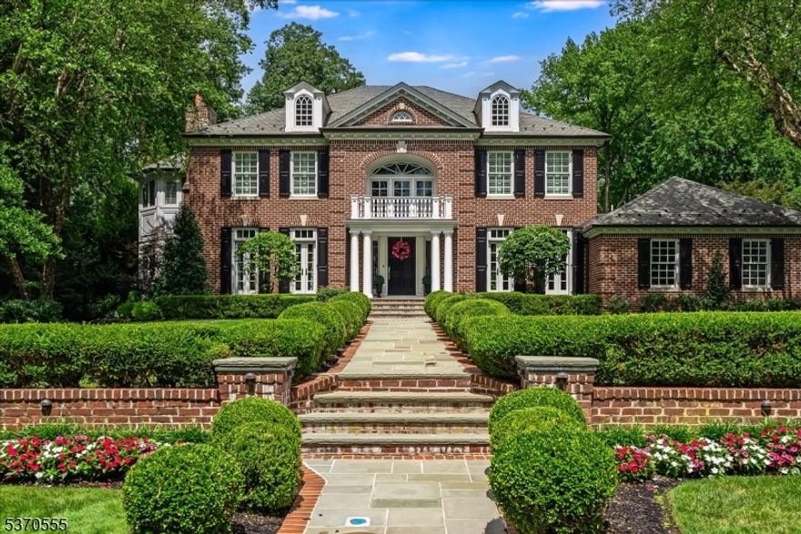 Discover this stunning five-bedroom, five-and-a-half-bath Colonial, ideally located in one of Westfield's most sought-after neighborhoods. Thoughtfully designed with timeless elegance and modern comfort, this home offers exceptional living space for both everyday living and entertaining.The light-filled interior features hardwood floors, custom millwork & finishes, and a gourmet kitchen with top-tier appliances that opens to a spacious family room with a fireplace. A formal dining room, elegant living room, and private home office add to the home's refined appeal.Upstairs, the luxurious primary suite includes a spa-like primary bath and walk-in closet, with three additional bedrooms one Jack & Jill one private en suite.The beautifully landscaped backyard is a private retreat with a pool and expansive patio. Additional highlights include a finished basement, three-car garage, and close proximity to top schools, downtown Westfield, parks, and NYC transportation.