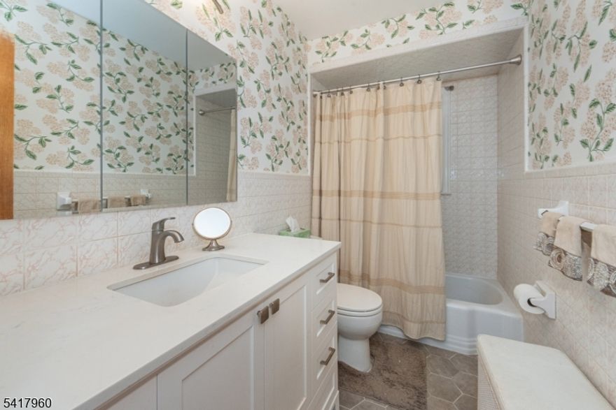 Beautifully Maintained Bi-level - First Time Offered! Welcome to this lovingly maintained one-owner bi-level home offering space, versatility, and exceptional outdoor living. Featuring 4 bedrooms and 2 full bathrooms. The main level offers a bright and spacious layout with comfortable living/dining areas, an eat-in-kitchen, and generously sized rooms. Downstairs you'll find a private suite with a fourth bedroom, full bath, second kitchen, family room, sitting room, laundry area, sunroom creating the perfect setup for guests. Step outside and enjoy your own backyard retreat. The property features a walk-out lower level leading to a patio and a beautiful in-ground pool, ideal for summer entertaining. A bar area and gazebo adds to the fun and makes hosting gatherings effortless. Additional highlights include a home generator,  2.5-car garage, breezeway/sunroom connection, and wonderful curb appeal, all set on a property enhanced by a peaceful pond and nicely maintained yard. This special home has been pridefully owned by its original owner and offers incredible potential for today's lifestyle. A rare opportunity to own a home with space, character, and resort-style oasis.