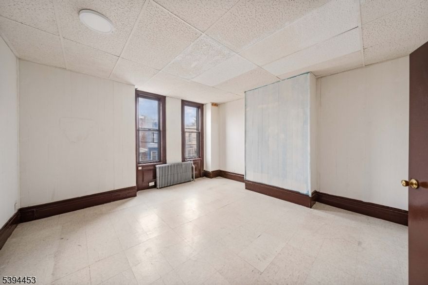 This cozy one family home features a total of 3 bedrooms and 1 full bath, an inviting living room followed by an eat-in-kitchen, a bonus room. The open basement presents plenty of storage options and convenience, including an alternative entrance from the front of the property. This additional access point enhances the home's functionality and appeal.  Property is around the block from the MLK Drive Light Rail Train Station, a commuters dream! Close to markets, parks, schools, restaurants and so much more! This area has been inundated with new construction and projects in the last years, don't miss this opportunity and book your appointment today! Property being Sold As Is.