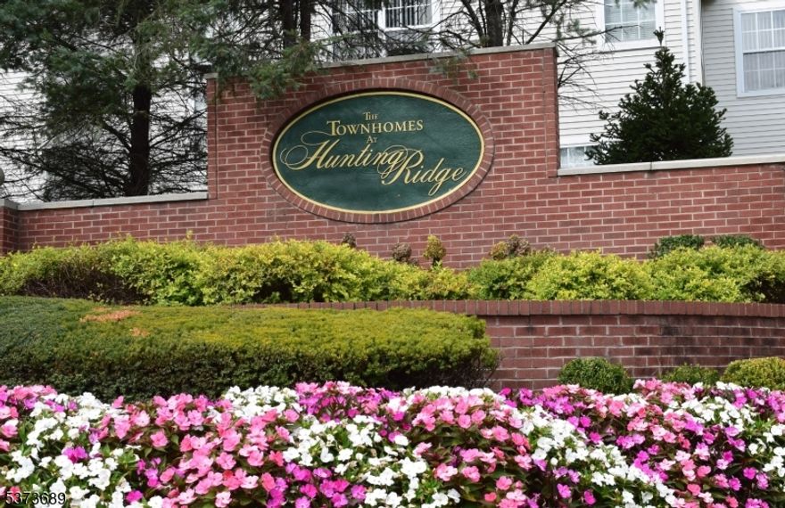 HAPPY HOLIDAYS - Incredible Opportunity - Temporary Price reduction for 30 day closing ! Compare to recent sales to see the Value - Commuters dream. Walk to NY bus or shopping. - Close to multiple highways yet offering a pleasant suburban neighborhood - best combination of convenience & comfort. Great location in the community on a quiet CUL DE SAC - North facing - Upgraded Brittany unit. Open floor plan with WOOD FLOORS on both levels & recessed lights. Kitchen with well laid out counter space & cabinets, tile back splash & SS appliances - Separate breakfast area - Sliders to private DECK & yard. Family room with gas fireplace. Powder room & inside access from garage. Master bedroom with en suite bath - double sinks, soaking tub, shower & walk in closet with CLOSET ORGANIZERS. Second floor laundry, 2 other spacious bedrooms & main bath. Fully Finished basement with Laminate floors & a full bath. Versatile space can function as media / game room and office. Plenty of Storage too. 1 Car garage & assigned parking spot.  Lots of Visitor parking - Convenient  & numerous visitors parking nearby. Newer HOT WATER HEATER (2020) GAS HEAT (2024) & CENTRAL AIR ( 2025).  Complex has outdoor pool & club house - snow removal included in HOA fees. Quick closing possible.