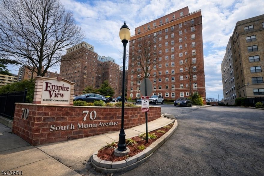 Welcome to Condo #202 in the highly desirable Empire View luxury condominium community. This spacious one-bedroom residence offers approximately 750 square feet of comfortable living space. The generously sized bedroom features two large closets, providing ample storage. The unit also includes stainless steel kitchen appliances, such as a refrigerator, microwave, and dishwasher, along with the convenience of an in-unit washer and dryer. Residents of Empire View enjoy a range of premium amenities including 24-hour concierge and security, a fully equipped fitness center, and a media room with a full kitchen, perfect for entertaining guests. The recently updated lobby and common areas create a welcoming atmosphere upon entering the building. The unit also includes one indoor parking space. Conveniently located near public transportation, major highways, shopping, and dining, Empire View offers both comfort and accessibility. Don't miss the opportunity to own in this well-maintained luxury condominium community.