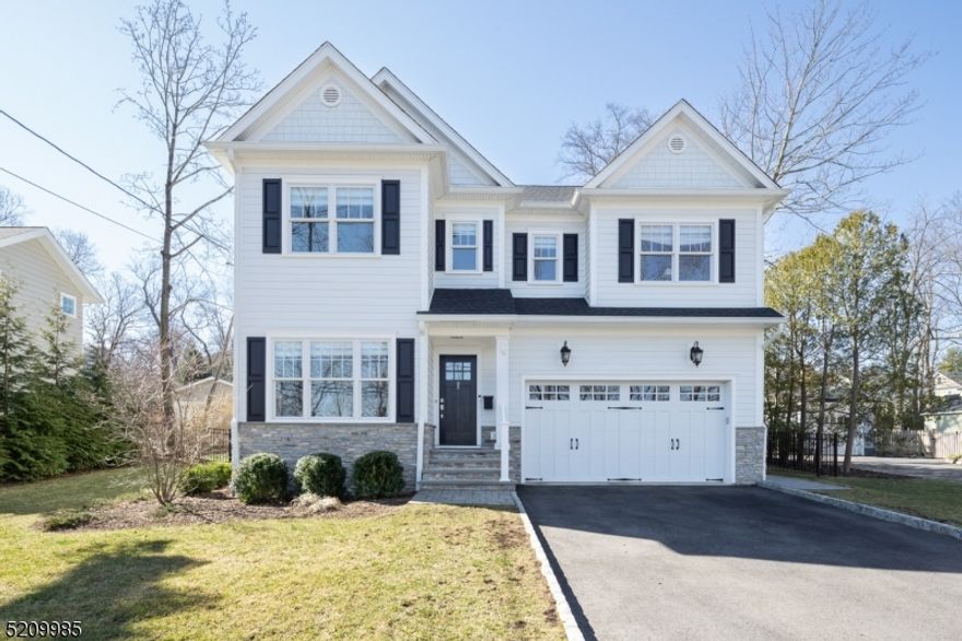 High Quality S. DeMarzo & Sons home in premier Chatham Boro location has over 3,800 livable sq ft.  This 4 year young home is a 5 bedroom, 4.1 bath Colonial which boasts high ceilings, exquisite details & a great open floor plan. It is minutes to town, train and schools. A white kitchen with quartz counters & center island opens to a large and bright family room with coffered ceiling and a gas fireplace. The first floor also has a dining room, living room, powder room, mudroom & 2-car garage. The second floor has a spectacular master suite with tray ceiling and large windows with view to the backyard, 2 large walk-in closets & a luxurious marble bath. There are 3 additional bedrooms that are en-suite. The finished lower level boasts a recreation room, bedroom & storage. A recently finished patio with a gas fireplace completes this home and makes the outside perfect for entertaining in your private and flat backyard.