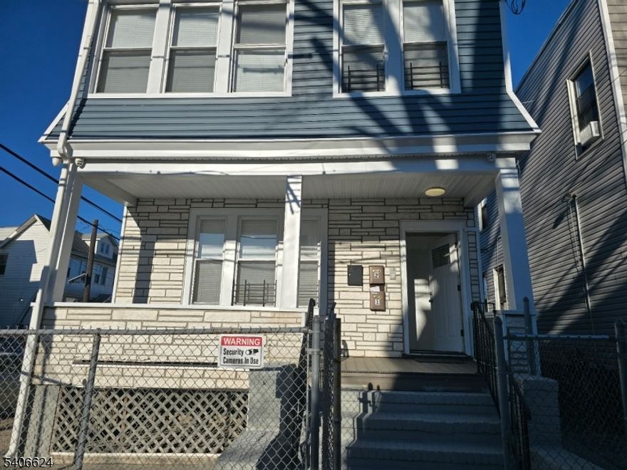 Newly renovated 5 bedroom 2 family nestled on a corner lot with huge 3 car garage. Listing includes bonus lot adjacent with unique address 29 st James. Property is conveniently located near schools and places of worship. Turn key asset with tremendous upside.