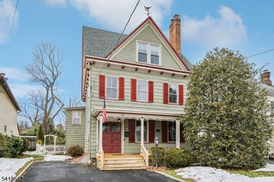 This stately five-bedroom Colonial stands as a monument to traditional symmetry and enduring craftsmanship, greeting guests with an inviting entry foyer and windows that define its historic facade. The Lemonade Porch offers a soothing sanctuary for quiet relaxation, while the grand center-hall foyer reveals a rare, open layout designed for seamless formal entertainment. Inside, the home is rich with old-world character, showcased through wide-plank hardwood floors, intricate crown moldings, and a commanding brick fireplace.The home's proportions extend to the upper levels, where three spacious bedrooms feature high-ceilings and abundant natural light. Tucked away on the third floor, a charming two-bedroom retreat provides a private escape defined by the unique angles and cozy nooks of the home's architecture.The experience continues outdoors in the private, retreat-like backyard an ideal setting for grand gatherings, complete with a sprawling stone patio. Thoughtfully modernized for today's lifestyle, recent updates include renovated bathrooms and a gourmet kitchen, ensuring every corner of this residence embodies old-world charm while offering modern luxury. It is, quite simply, the perfect place to call home