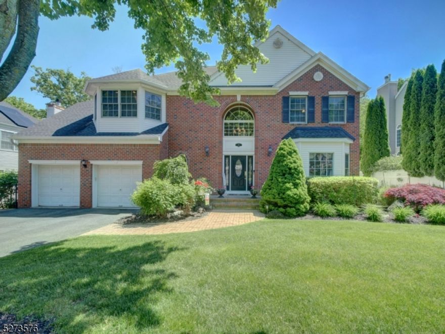 Gorgeous brick front Colonial located in desirable Poets Peak features 4 bedrooms & 3.5 baths and is situated on almost one acre with tree lined yard for privacy. This beauty showcases a newer roof (2019), an impressive two story foyer, open floor plan & bonus feature of having California Closets in every bedroom & laundry/mud room. The first floor boasts a large grand foyer, formal living & dining rooms, family room with gas fireplace, large powder room & spacious kitchen with center island and French doors that lead to entertaining sized deck overlooking private, fenced yard (property line goes way beyond present fence). Ascend to the second floor to find four generously sized bedrooms, updated main bath & beautiful primary suite with renovated luxury bath with free standing tub, partially heated tub, gorgeous vanity & shower, huge walk in closet and separate space perfect for dressing area, reading nook or home office. The full finished basement features a full bath, wet bar, separate room used as exercise room, additional versatile space perfect for recreation & plenty of storage. Other features include central vacuum & public utilities.  This home is conveniently located mins to major roadways Routes 80, 46, 10 & 206. This is a must see!