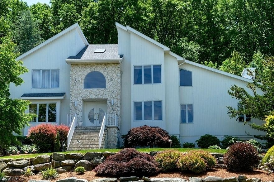 Spectacular Custom Hi-End colonial situated on beautifully landscaped property in a desirable location of Rockaway Twp for rent. This home has so much to offer. Amazing Mountain view from this house. Main level has an open floor plan with big size Living, Dining, Big size Kitchen, Huge Family room, Office room and Powder room. Magnificent and super expensive kitchen offers abundant high end cabinets and counter spaces with huge Island and additional seating plus stainless steel appliances. Upstairs 4 bedrooms, 2 full baths. Big Finished basement with full bath. Relax outside in Patio in front of the custom gas Fireplace and heated Swimming Pool. Tenant is responsible for pool, landscape maintenance, Garbage collection, Snow cleaning and responsible for first $150 for each repairs. New carpets were installed recently. Basement range oven is disconnected and not for use.