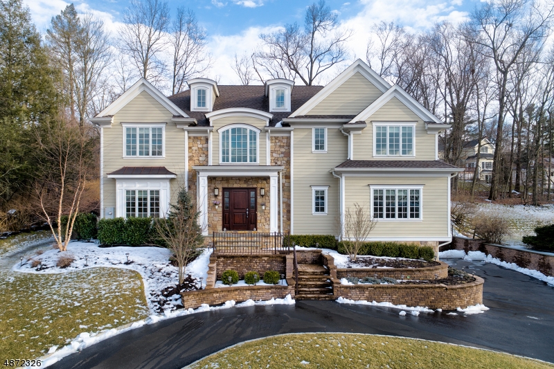 Elegance, sophistication & remarkable architectural details abound in this like new 6 bed, 5½ Bath custom colonial on quiet street in Deerfield section! Soaring ceilings, 3 car gar, horseshoe driveway 1st lvl feat. 2-story Entry Foyer, cust. millwork & moldings, gleaming h/w fls t/o. Frml DR w/coffered ceiling, Elegant Liv Rm, outstanding Fam Rm w/stunning coffered ceiling and fireplace. Out of this world Chef's Dream Kitch w/top of the line Wolf & Sub Zero appliances! Breakfast Rm w/abundant light & easy access to rear patio and private yard.  2nd lvl feat. dazzling MBR retreat w/the BEST w/in Closet & spa-like bath w/dreamy crisp white cabinetry & marble t/o. 3 additional spacious beds w/fully cust clsts (1 ensuite & others share gorg bath). Huge LL w/fantastic Mudrm, Guest Suite, Rec Rm!