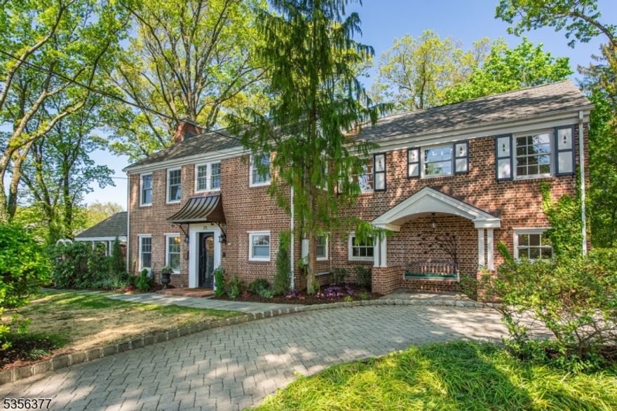 Discover the charm of 25 Hillcrest Rd, an expanded Belhall colonial on a picturesque .57-acre lot with seasonal lake views. Nestled on a tree-lined street, this home is close to top schools, the town center, train station, and lake activities. Step into a foyer that introduces exquisite details and high-end finishes throughout. The living room, with its stately fireplace, connects to a covered loggia. The gourmet kitchen, complete with a breakfast area and deck access, flows into a Great Room with a barreled ceiling and fireplace perfect for entertaining. The first floor also features a study with backyard access, a powder room, and a mudroom next to the two-car garage. Upstairs, find two bedrooms sharing a hall bath, a bedroom with an ensuite, and a luxurious primary suite with a walk-in closet, lavish bath, fireplace, and private deck. The lower level includes a billiard room with patio access, a recreation room with a fireplace, ample storage, and a powder room. Enjoy outdoor beauty from the loggia and two-tiered deck. Recent updates include fresh paint, new windows, a new front door and entrance, refinished floors, electrical upgrades, and landscaping. Move in and enjoy the Mountain Lakes lifestyle!