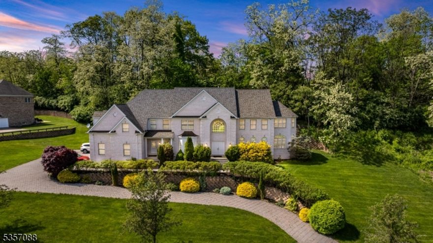 Experience timeless elegance and exceptional luxury in this magnificent Montville estate! Featuring 6 spacious bedrooms, 4 full bathrooms, and 2 half baths, this home is perfectly designed for comfort, functionality, and upscale living. Each of the five upstairs bedrooms offers its own private bathroom, an ideal layout ensuring privacy and convenience for everyone. The grand entry welcomes you into a breathtaking living room with soaring ceilings and a stately fireplace, creating an ambiance of warmth and sophistication. The home's thoughtful design blends refined architectural detail with expansive, light-filled living spaces, making it perfect for entertaining and everyday enjoyment! The heart of the home is the beautifully updated kitchen, equipped with high-end appliances, sleek cabinetry, and premium finishes that will delight any home chef and make every gathering memorable.Located in prestigious Montville Township known for its top-rated schools, small-town charm, and unbeatable access to NYC this home places you near parks, golf courses, upscale shopping, and fine dining, all while enjoying the serenity of a private estate setting.This one-of-a-kind home is a rare opportunity to own a luxurious retreat in one of North Jersey's premier neighborhoods don't let it pass you by!