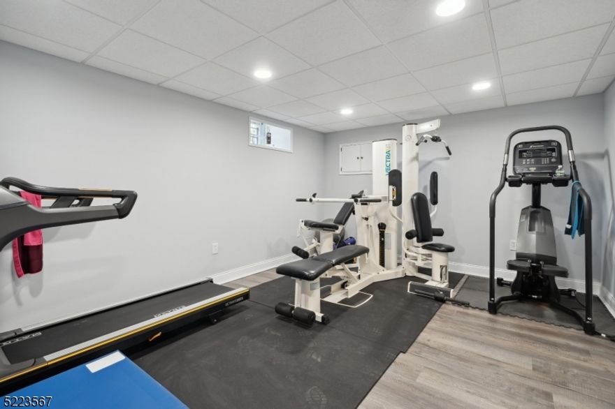 SPECTACULAR PROPERTY!!  This is the home you have been waiting for!! This five-bedroom, three-bathroom beautiful colonial offers an amazing outdoor entertaining area featuring two tier Trex deck with built in fire pit, sitting area, pergola w/motorized/retractable awning; outdoor kitchen counter with built in grill;  extensive patio; and heated salt water spa/pool.  The first floor offers impressive living room/sun room, two story great room with gas fireplace, large eat in kitchen with an island, granite counter tops, high-end stainless-steel appliances, breakfast area, formal dining room, family room with wood burning fireplace, an office with built in desks, bedroom and full bathroom. Second floor features master bedroom suite with full bathroom, walk-in closet and sitting room; three other spacious bedrooms, main bath.  Partially finished basement includes wine cellar!  Three car garage, all large rooms, mostly hardwood floors, all public utilities, amazing sunsets complete the picture of perfection. This home has been loved, updated, and cared for!  Too many features too list!! Seeing is believing!!