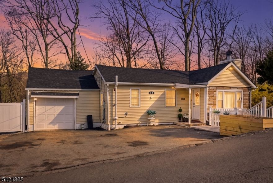 Welcome to 23 Roosevelt Trail, a beautifully renovated home that blends modern upgrades with comfortable living in the heart of Hopatcong.This 3 bedroom, 1.5 bath home was fully renovated in 2024, offering peace of mind with updated finishes and systems throughout. The home features an attached garage for convenience, along with a finished basement that provides valuable additional living space perfect for a rec room, home office, or gym. Out back, you'll find a true retreat. The deck was recently expanded, creating the perfect setting for gatherings or relaxing evenings. The patio with a fire pit adds warmth and character, while the unique sunken backyard offers a private, inviting outdoor space you won't find everywhere. Move in ready with thoughtful upgrades inside and out this is one you don't want to miss.