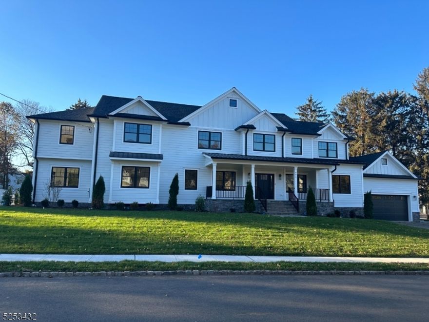 Welcome to this exceptional new construction 7 bedroom, 6.1 bathroom home offering over 7500 sq. ft. of living space and set on .64 acres in the prestigious North side of Westfield. This home features a spacious open floor plan with exquisite custom millwork, white oak hardwood flooring, designer light fixtures and outstanding tile selections. With 9-foot ceilings, the first floor offers a white oak beamed ceiling and dry bar in the great room, a butler's pantry, in-law suite, office, library/sunroom, formal dining room, powder room and mudroom. The kitchen features high-end stainless steel appliances, center island, quartz countertops, custom cabinetry, and a massive walk-in pantry. The 2nd floor offers 5 bedrooms including a luxurious primary suite featuring a wood plank vaulted ceiling, spa-quality bathroom with heated flooring, spacious curbless shower and freestanding tub. The 2nd and 3rd bedrooms have walk-in closets and their own bathrooms. The 4th & 5th bedrooms share a jack-n-jill bathroom. The second floor is rounded out by a spacious laundry room. The fully finished basement with 9-foot ceilings has an expansive rec room with a wet bar and beverage cooler, a bedroom, and a full bathroom. Step outside to a sweeping outdoor space, a gorgeous paver patio with custom fireplace, built in speakers & plenty of room for a pool, making this perfect for outdoor entertaining. Your journey to luxury living starts here at 405 Roanoke Road, Westfield.