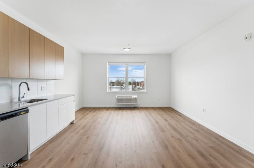 This brand new 116 unit residential community is equipped with in-home washers and dryers, stainless steel appliances, and soft-close, hardware-free cabinets, elevating both aesthetics and functionality. Oversized windows flood each space with natural light, creating a bright, inviting atmosphere. Select units feature private terraces, offering refreshing outdoor space and a new perspective on leisure. More than just a home, Hue Soul is a retreat from the ordinary, designed to nurture both well-being and connection. Stay active in the state-of-the-art gym, find relaxation in the wet and dry saunas, rejuvenate in the cold plunge, or practice peace and intention in the dedicated yoga room. Need a quiet place to focus? The modern co-working space provides an inspiring environment for productivity.  At Hue Soul, community comes to life-where neighbors become friends. Whether unwinding or entertaining, the rooftop deck sets the scene with an outdoor kitchen, fire pit, and patio seating. Inside, the lobby lounge offers a welcoming space for socializing, while the movie room provides the perfect spot to kick back and enjoy a film. For those who value sustainability, eco-conscious residents will appreciate the convenience of electric car chargers. Every amenity is designed to support a lifestyle that feels as good as it looks. Experience life in full brilliance at Hue Soul schedule a tour today and discover the difference in every detail.