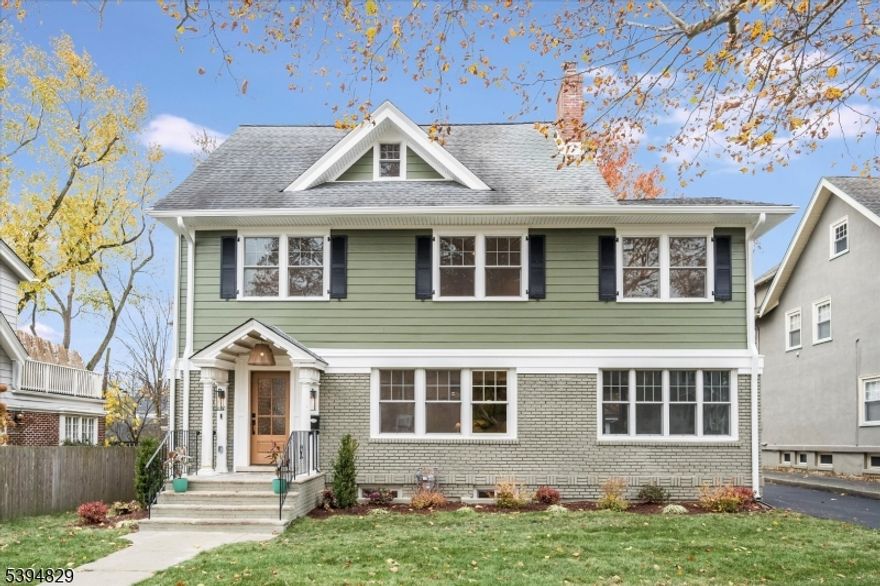 Fully renovated colonial offering the perfect blend of timeless style and modern luxury. This reimagined home features designer finishes, custom millwork, and an open concept floor plan ideal for today's lifestyle. The chef's kitchen is a showstopper w/ a large quartz island, custom cabinetry, Dacor stainless appliances- including double wall ovens and 6 burner gas range,pot filler and hood- plus a built-in coffee station. The kitchen opens seamlessly to a spacious great room with a gas fireplace and sliders to a new deck and level, fenced yard perfect for relaxing or entertaining. The prime location can't be beat- just steps to Watchung Plaza, with NYC Midtown direct train, boutiques, coffee shops and restaurants.Close to Brookdale Park with playgrounds, dog parks, rose garden, tennis and pickle ball courts, summer concerts and more! All systems are new- plumbing, electric, hvac, roof, windows and siding. Featuring 7 bedrooms, with 1 bedroom plus ensuite bath on first floor,  4 bedrooms, 3 full baths plus laundry room on the second floor and 2 bedrooms plus full bath on third. The primary suite impresses with vaulted ceiling, gracious closet, luxurious bath with dual vanity, soaking tub, oversized shower and heated floor. Balcony of the primary with views out to the backyard. Special touches include arched doorways, coffered ceilings, bar area with wine fridge, home office and wallpapered powder rm. 120 Beverly is the perfect opportunity to enjoy all Montclair has to offer!