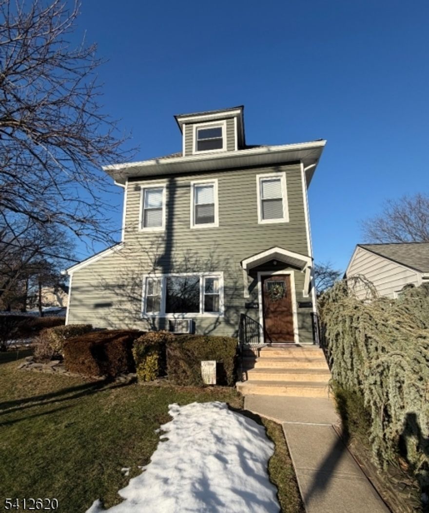 Step into this newly renovated 2nd-floor apartment and be welcomed by a spacious living room, an ideal spot to unwind after a long day. Just off the living room, you'll find a separate dining area, great for meals and entertaining. The kitchen features custom cabinetry, quartz countertops, and a stylish tile backsplash, with plenty of storage for all your essentials. This unit offers a spacious bedroom along with a versatile bonus room, perfect for a home office or an extra bedroom. The full bathroom features a tub/shower combination and a convenient storage vanity. Laundry is easily accessible in the basement, complete with a washer and dryer ready for tenants. One driveway parking spot is included, with the option to rent an additional garage space for added convenience. Tenants have one driveway parking spot included, with the option to rent a garage space for an additional monthly fee. This home is conveniently located just steps from NYC transportation, major highways, schools, and shopping.