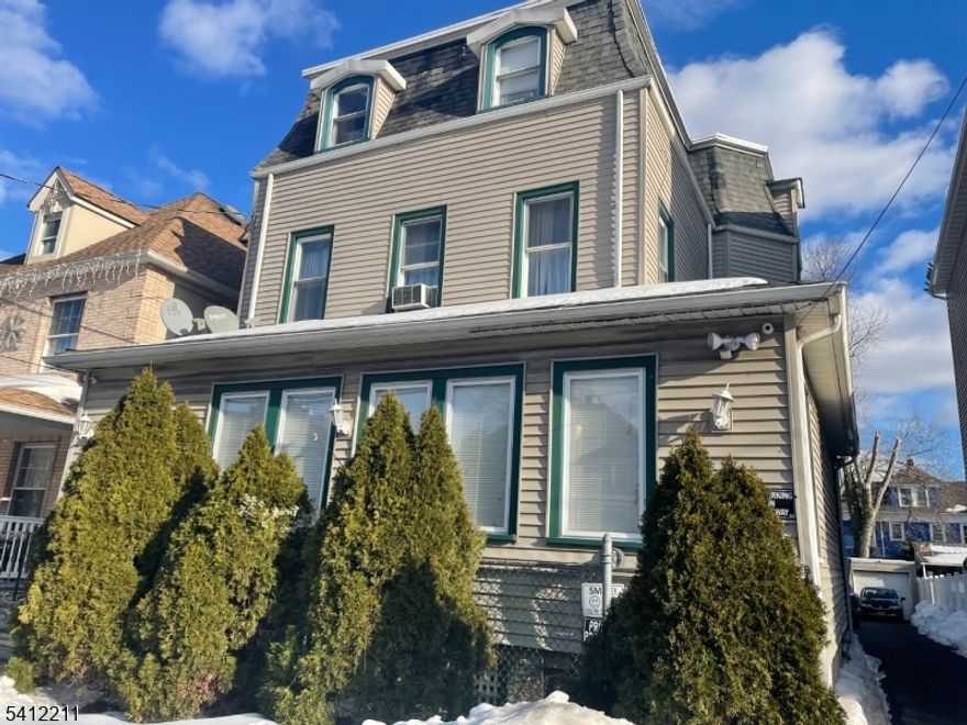 TWO FAMILY HOME  WITH GARAGE AND DRIVEWAY , SECOND FLOOR HAS ALSO THE USE OF THE ATTIC EXTRA SPACE. A MUST SEE NEAR KEAN UNIVERSITY ,CLOSE TO TRAIN MAJOR ROUTES AND OTHER PUBLIC TRANSPORTATION.  .AN EXCELLENT OPPORTUNITY FOR BOTH INVESTORS AND OWNER OCCUPANTS.