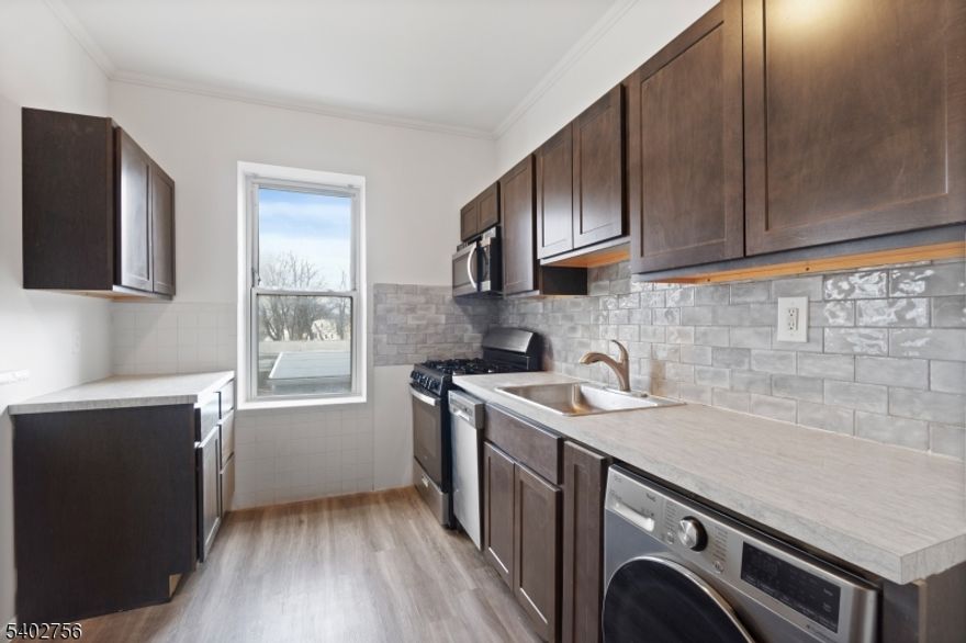 Charming and spacious 3-bedroom, 2-full-bath duplex residences available in a beautifully renovated historic building under new management. These unique homes feature original hardwood flooring throughout, soaring 9-foot ceilings, and a striking spiral staircase that adds architectural character. Thoughtfully designed layouts offer generous living space and ample closet storage.The updated kitchens showcase cherry wood cabinetry paired with stainless steel appliances, blending classic elegance with modern convenience.Building amenities include on-site laundry and elevator access. Carport parking available for an additional fee. Pet-friendly (fee applies).Ideally located within walking distance to downtown Bloomfield, with easy access to major highways and mass transit.