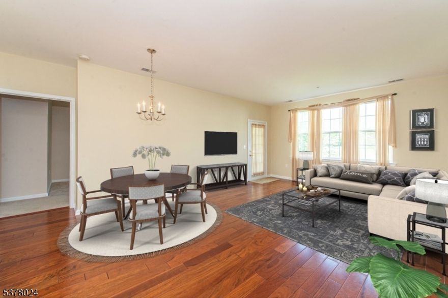 Welcome to this desirable first-floor, one-level condo in The Grande, featuring 2 bedrooms, 2 full bathrooms, and a private 1-car garage. This beautifully maintained home offers a spacious, open floor plan with hardwood floors and abundant natural light throughout. The updated kitchen boasts maple cabinets, breakfast bar, a pantry, newer refrigerator & dishwasher and ample counter space. Enjoy year-round comfort with central air, natural gas heat, and the convenience of public utilities. Step outside to your private balcony, perfect for morning coffee or relaxing after a long day. Storage is never an issue, with generous closets and additional space throughout. Amenities include outdoor pool and clubhouse. Situated in a prime location, this home provides easy access to shopping, dining, and major commuter routes.