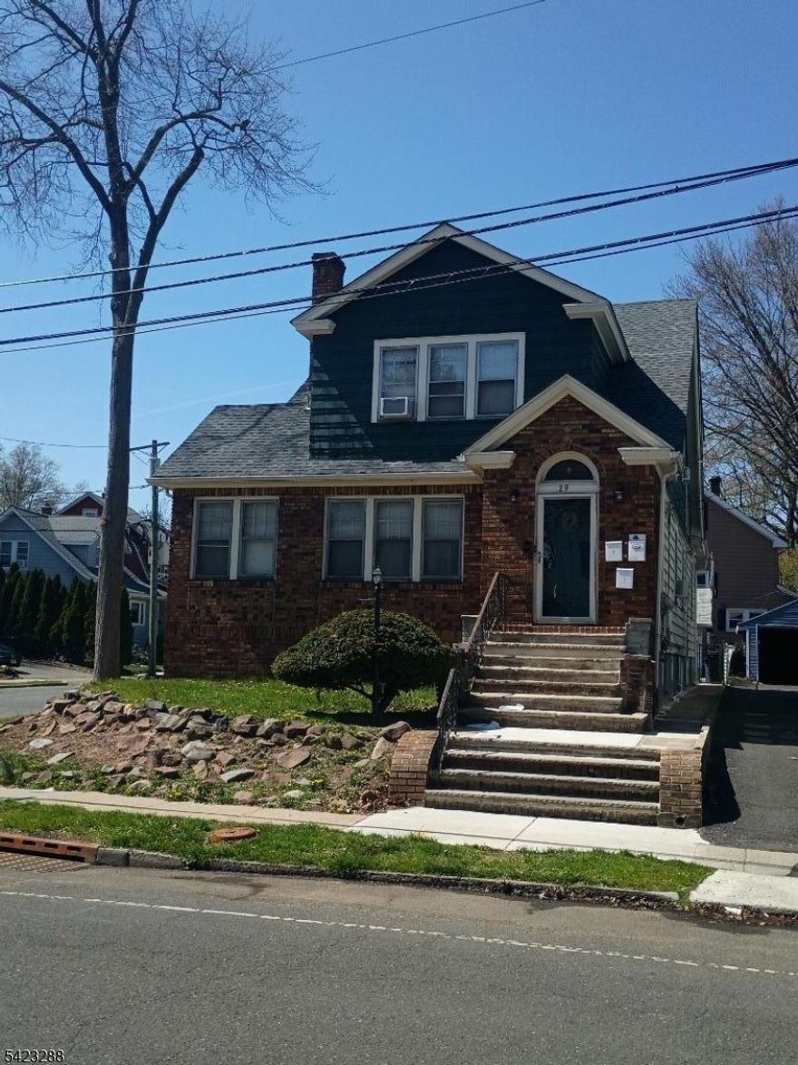 Adorable 2 family house with a lot of charm located on a corner lot with a tree lined, low traffic street in an unbeatable location. This property offers a great value in sought after Maplewood. The first-floor unit offers 6 rooms with plenty of natural light throughout in each room: Large living room-which can easily be converted into a 3rd bedroom- with decorative fireplace, large den/office, formal dining room, 2 good sized bedrooms with nice hardwood floors. There is an eat-in kitchen with a good size pantry, and a sliding door with direct access to the backyard. A full tiled bathroom with tub completes the unit. The sunlit second-floor unit offers 4 rooms. It consists of a great size living room, - that would be a great potential for the 2nd bedroom, - dining room, and one bedroom also have hardwood floors throughout. There is an eat-in kitchen with a pantry a well. As a bonus, there is a finished, walk-out basement with separate entrance: it has a full bathroom with shower, kitchenette, two additional rooms, laundry area, and utility room with two furnaces and hot water heaters, and 3 electric meters for convenience. A two-car garage with a driveway that fits 2 more cars provides convenient parking. Local parks, community pool, restaurant, NYC bound transit are just around the corner. Although the property is in great condition, will be sold in AS-IS.