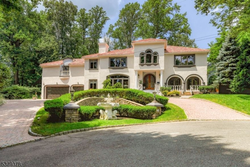 Welcome to your dream home in the desirable Baltusrol community. Nestled on a quiet cul-de-sac, this stunning custom residence offers a perfect blend of luxury, comfort, and craftsmanship. Step into the grand foyer with soaring cathedral ceilings and a modern, wood-burning fireplace, featuring clean lines, minimalist design, Whether you're entertaining or unwinding, the natural warmth and ambiance of real wood create a stunning focal point that adds both character and comfort to the space. The chef's kitchen features Wellborn cabinetry, quartz countertops, a custom coffee bar, Thermador appliances, dual sinks, and dual dishwashers. The backyard oasis includes a cabana with a full bath, sauna, hot tub, and radiant in-floor heat. A generous heated saltwater pool and multiple lounge areas make entertaining effortless. Inside, the first-floor mudroom offers a marble countertop, sink, and laundry hookup. A second laundry area is located in the upstairs great room/multipurpose/gym with vaulted ceilings, three closets, a granite counter, and oversized sink. The primary suite boasts a cove ceiling, dual walk-in closets, and a spa-like bath with heated floors, dual vanities, jacuzzi tub, steam shower, and a bidet. Additional highlights include a princess suite, rich hardwood flooring, DaVinci crown molding, and a heated 3-car garage with high ceilings and storage. This one-of-a-kind home truly accommodates every lifestyle. Schedule your private showing today!